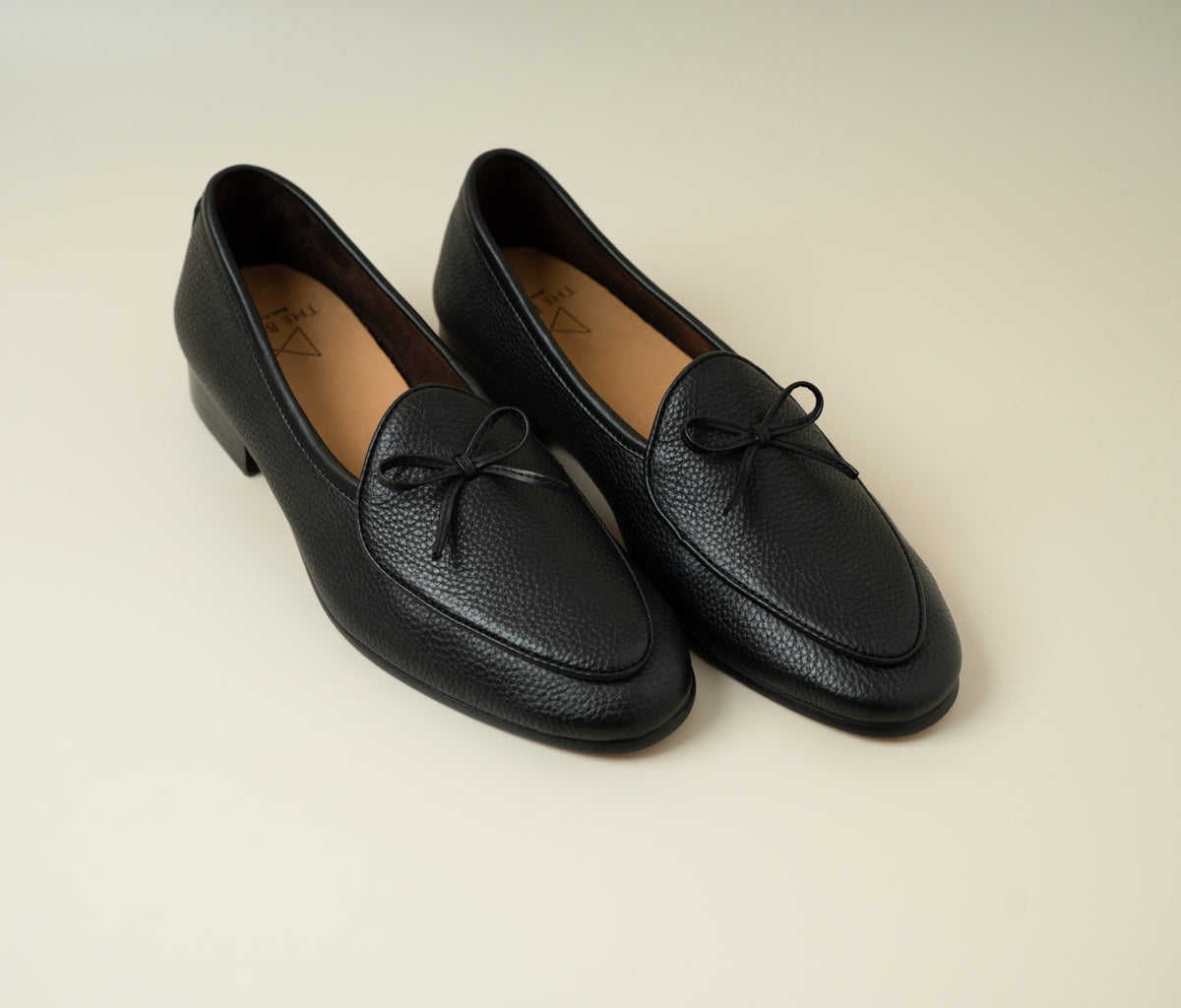 The Butler Sri Lanka Stonington Black Belgian Loafer - Jet-Black Full-Grain Leather with Almond Toe for Timeless Versatility