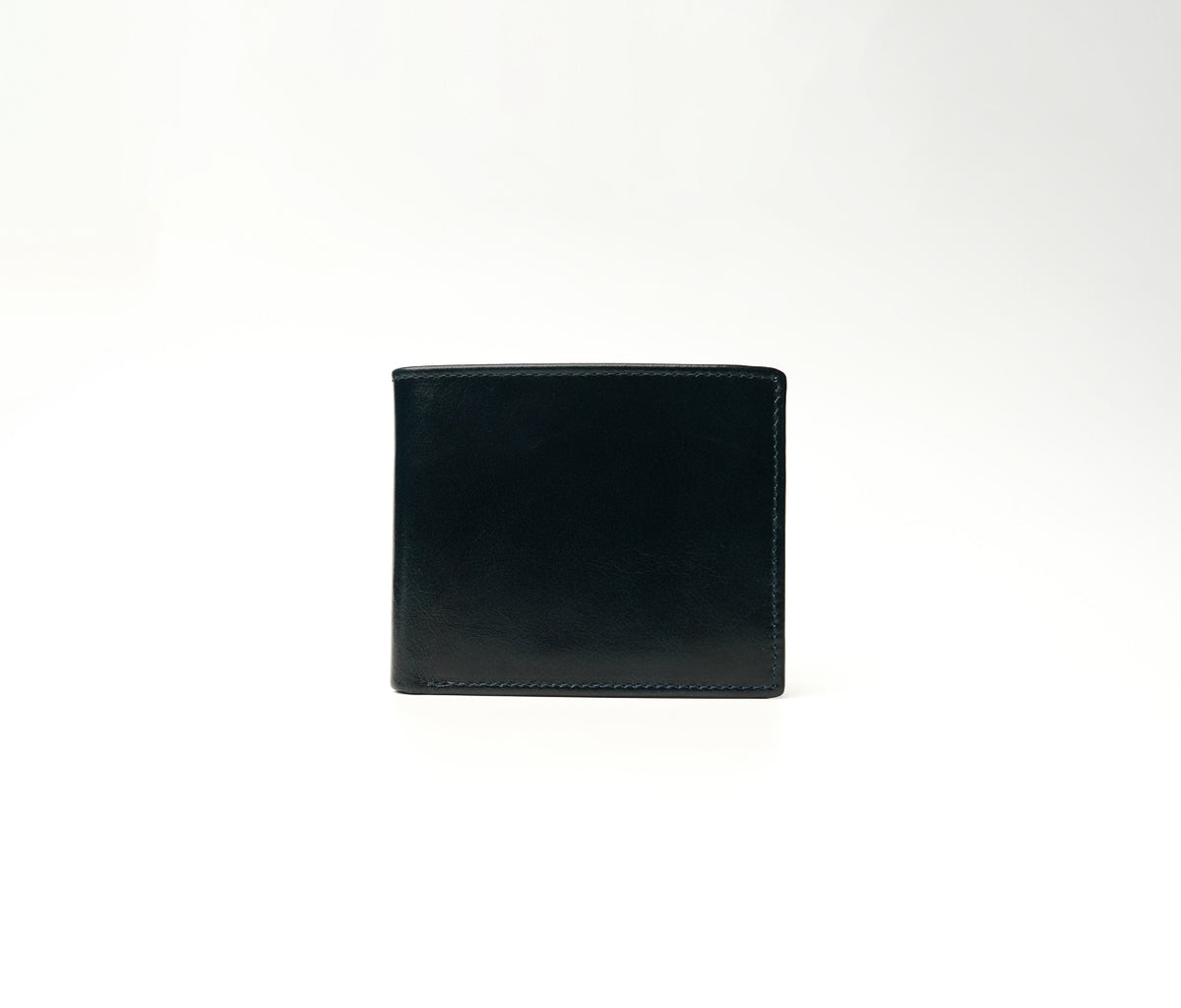 The Ambassador blue full-grain leather wallet with microfiber lining, 3 card slots, 1 transparent ID window, and 1 cash compartment (10.5 × 8.5 cm).
