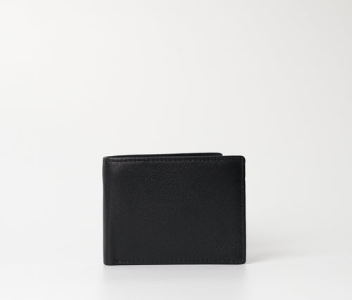 The Butler Sri Lanka Strider Black Wallet - Slim Full-Grain Leather with Pebble Grain Texture, 15 Card Slots, and ID Window.